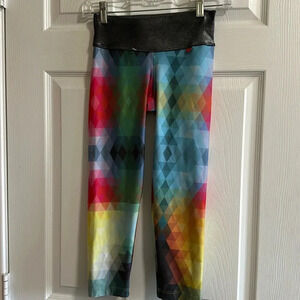 Fit mama multicolor Capri leggings. Metallic  waistband. Size XS